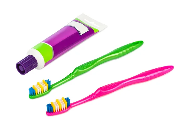 Toothbrushes and paste tube — Stock Photo, Image