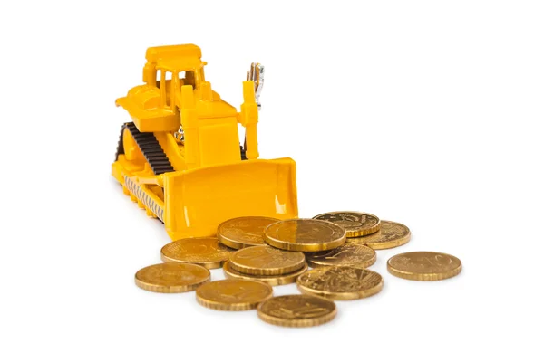 Toy bulldozer and money coins — Stock Photo, Image