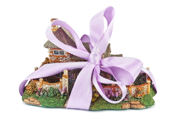 Toy house with bow as gift — Stock Photo, Image