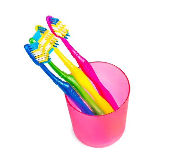 Toothbrushes in glass — Stock Photo, Image