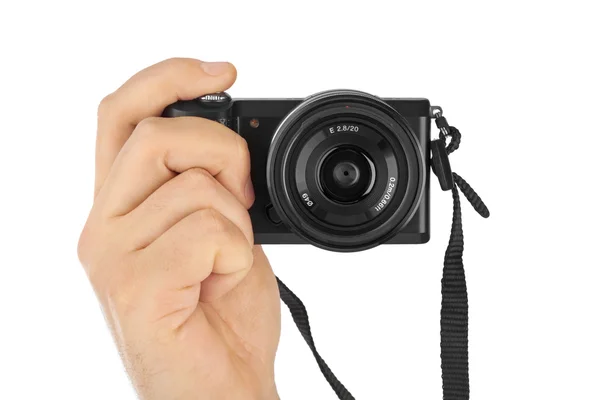 Photo camera in hand — Stock Photo, Image