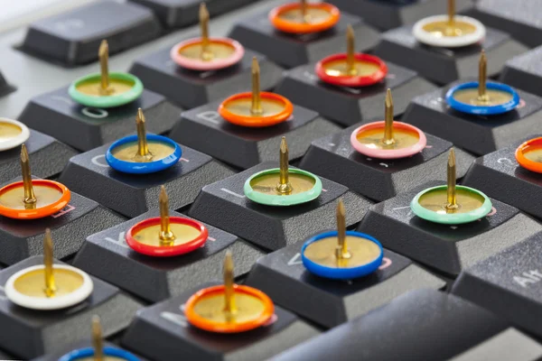 Pins on computer keyboard — Stock Photo, Image