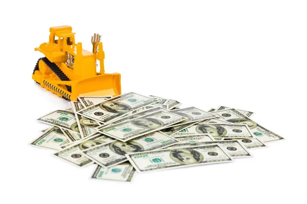 Bulldozer brinquedo e dinheiro — Fotografia de Stock