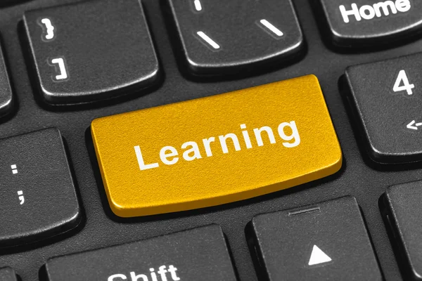 Tastiera del taccuino del computer con il tasto Learning — Foto Stock