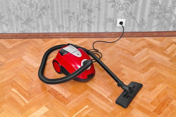 Aspirateur sur parquet — Photo