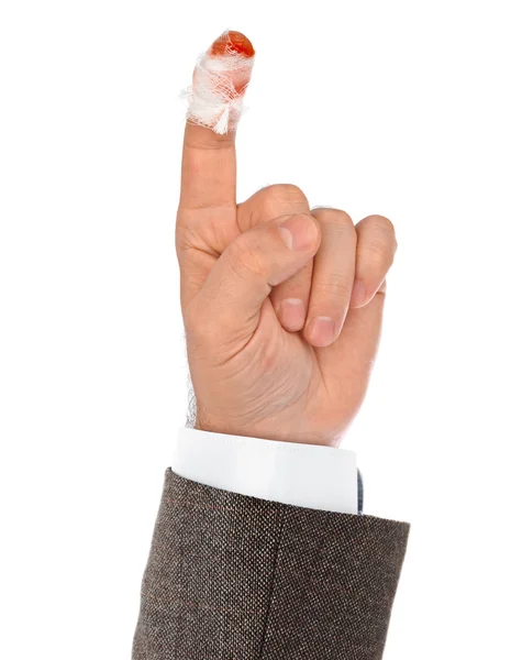 Hand med blod och bandage — Stockfoto