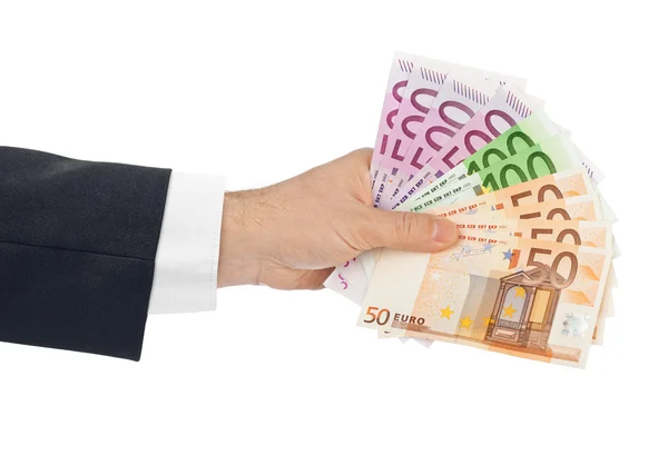 Hand met geld — Stockfoto