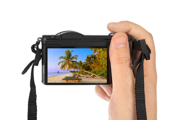 Hand with camera and Maldives beach photo (my photo) — Stock Photo, Image