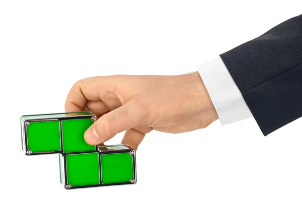 Hand mit Tetris-Spielzeugklötzen — Stockfoto