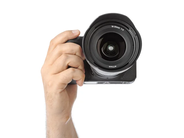 Photo camera in hand — Stock Photo, Image