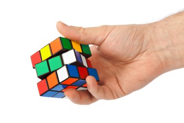 Cube puzzle in hand clipart