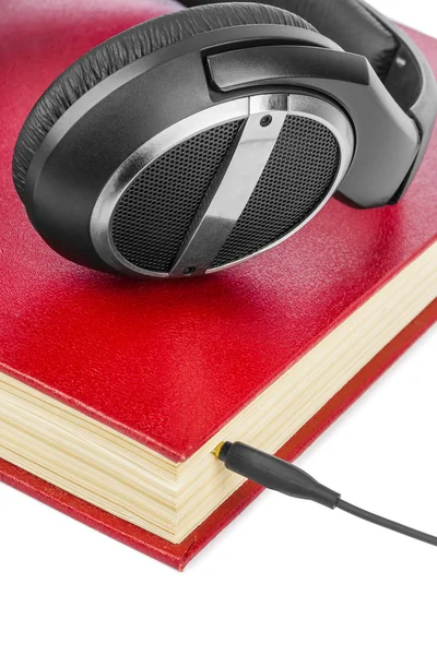 Ακουστικά και το βιβλίο — Φωτογραφία Αρχείου