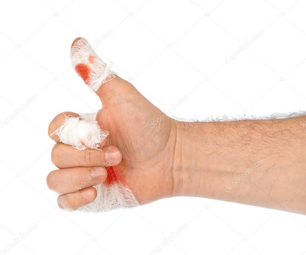 Hand thumb with blood and bandage
