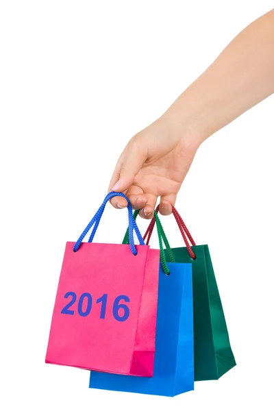 Mano con shopping bags 2016 — Foto Stock