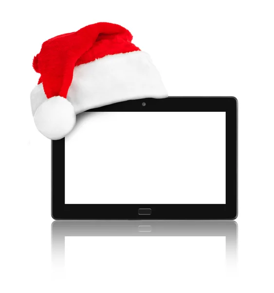 Touchpad pc en Santa Claus rode kerstmuts — Stockfoto