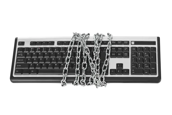 Teclado de computador e correntes — Fotografia de Stock