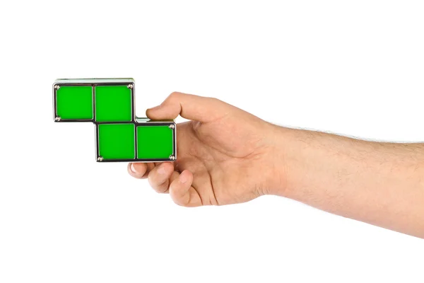 Hand mit Tetris-Spielzeugklötzen — Stockfoto