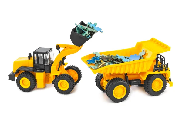 Zabawka ładowarka i ciężarówki z układanki — Zdjęcie stockowe