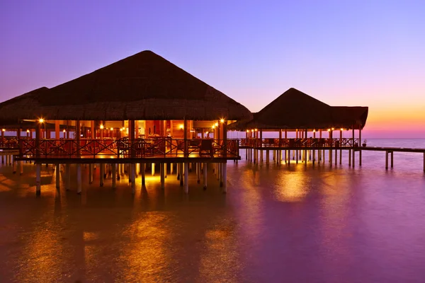 Water cafe at sunset - Maldives — Stock Photo, Image