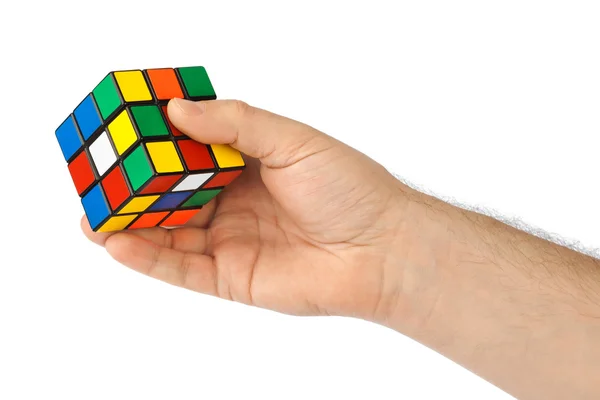 Cube puzzle in hand — Stock Photo, Image