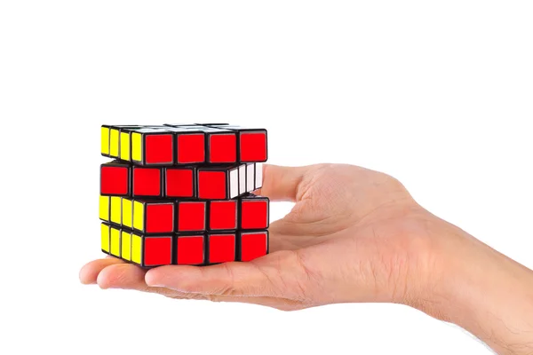 Cube puzzle in hand — Stock Photo, Image