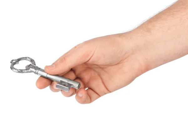 Hand met retro zilveren sleutel — Stockfoto