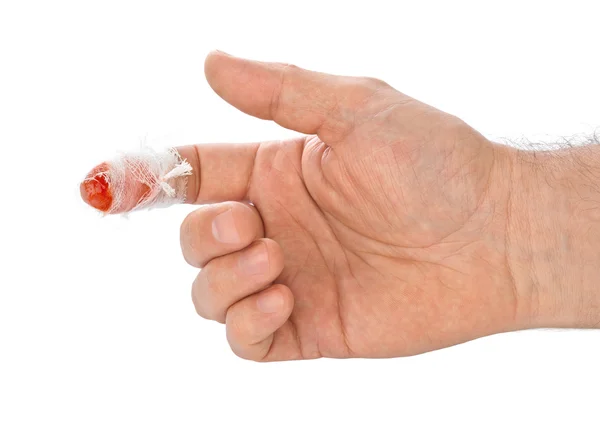 Hand med blod och bandage — Stockfoto