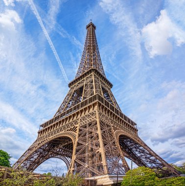 The Eiffel Tower against blue summer sky, Paris, France.