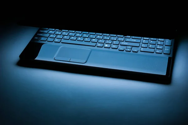 Covered Laptop Computer Light Shining Display Dark — Stock Photo, Image