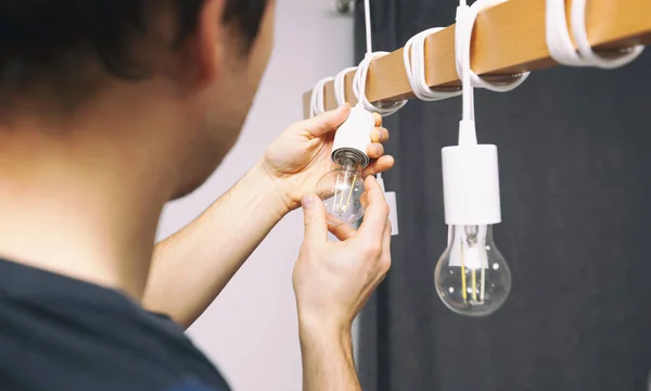 Electrician Installing Led Light Bulbs Chandelier — Stock Photo, Image