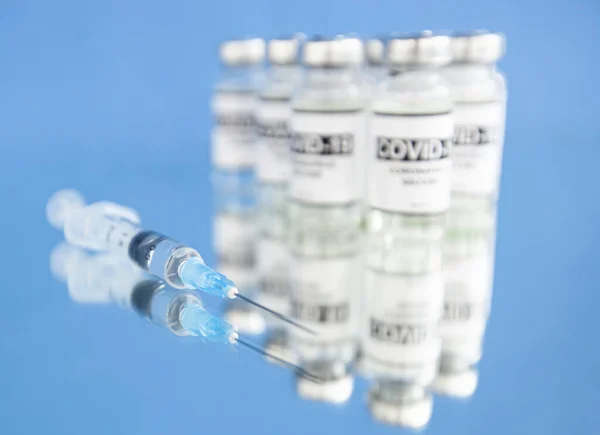 Vacuna Contra Coronavirus Covid Fondo Azul —  Fotos de Stock