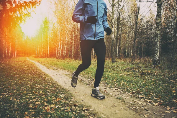 Young Man Running Autumn Park Pathway — Stock Photo, Image