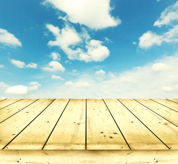 Wooden boards over a blue sky — Stock Photo, Image