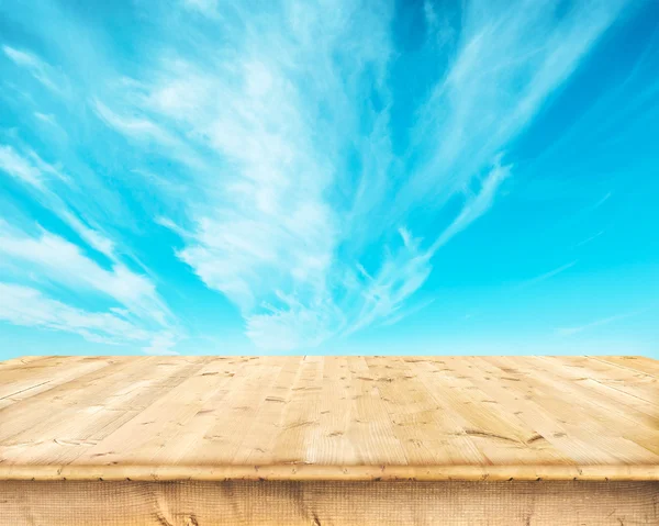 Boards over a blue sky — Stock Photo, Image