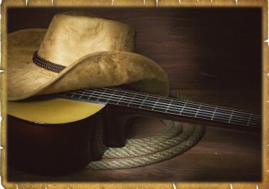 Gitar ve kovboy kıyafetleri ile ABD'li Country müzik arka plan