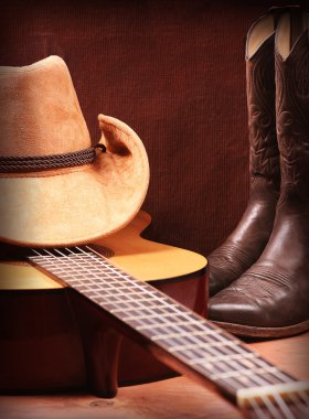 Country music with guitar and cowboy clothes