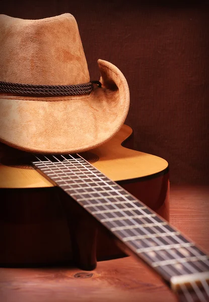 Chapéu de cowboy e guitarra para texto — Fotografia de Stock