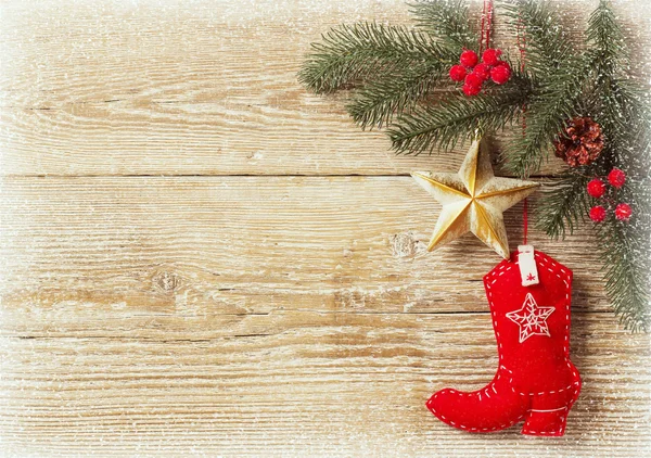 Christmas background with cowboy shoe decoration — Stock Photo, Image