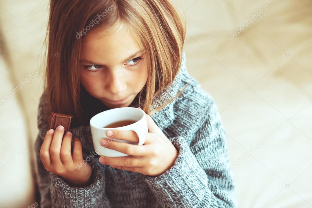 Child drinking tea