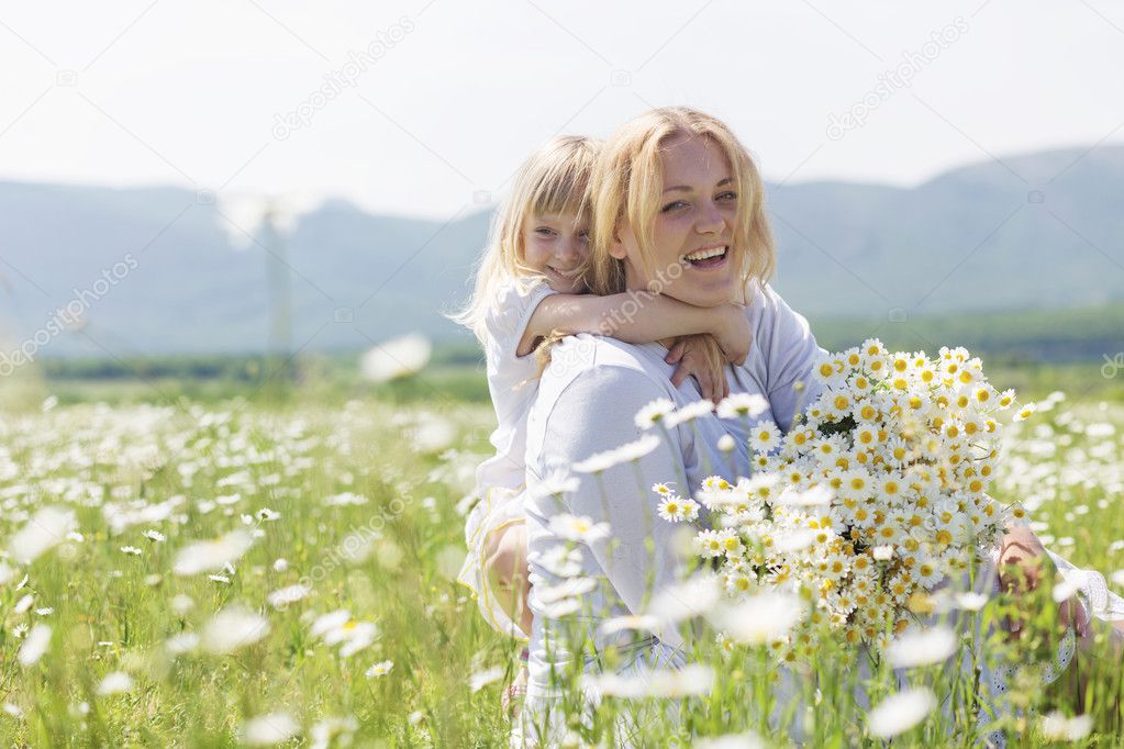 Family in flower field