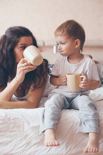 Mom relaxing with her little son — Stock Photo, Image