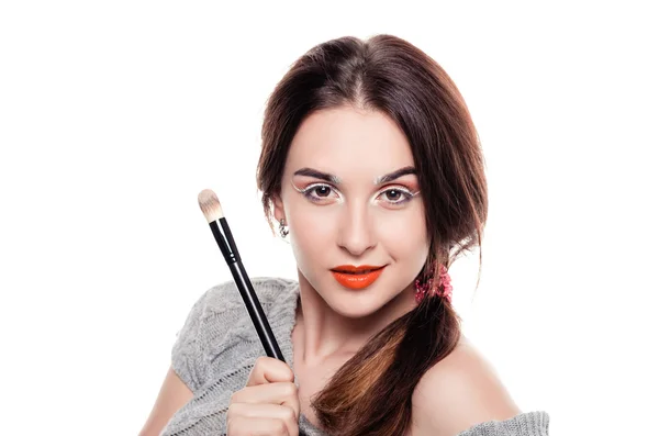 Woman with make-up brushes — Stock Photo, Image