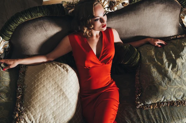 Beautiful woman in red dress — Stock Photo, Image