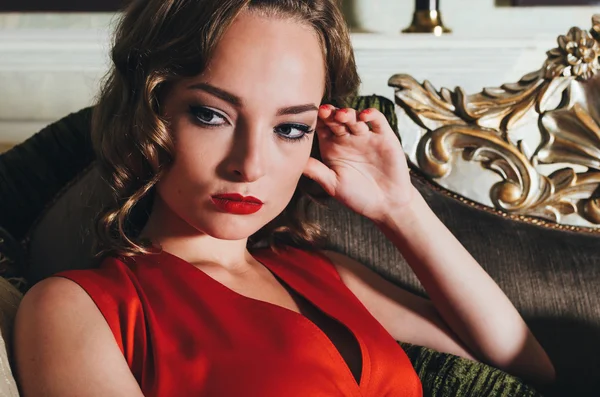 Beautiful woman in red dress — Stock Photo, Image