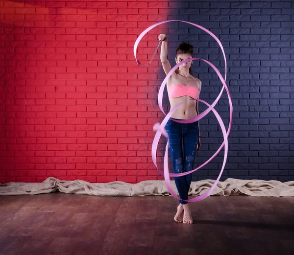 Cute girl dancing with ribbon — Stock Photo, Image