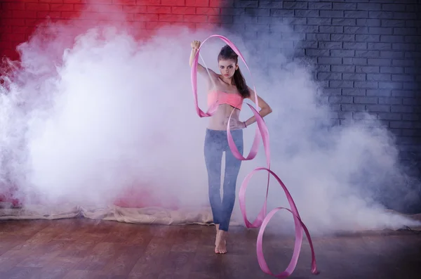 Cute girl dancing with ribbon — Stock Photo, Image