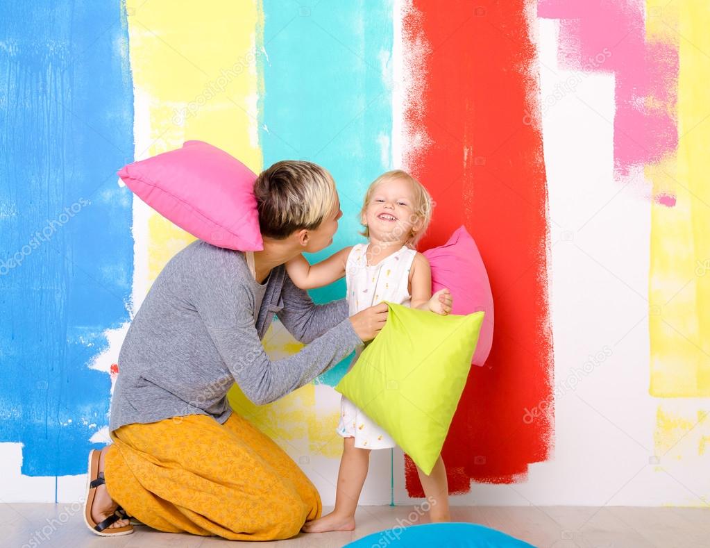 Mother and daughter have pillow fight — Stock Photo © rainfall #120109092, image size:1023x789