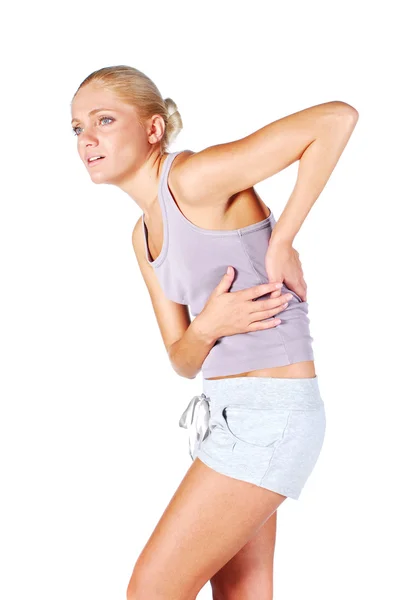 Woman massaging pain back — Stock Photo, Image