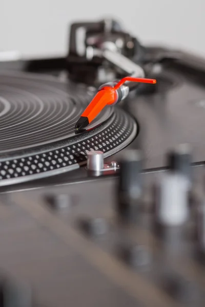 Turntable playing vinyl record with music — Stock Photo, Image