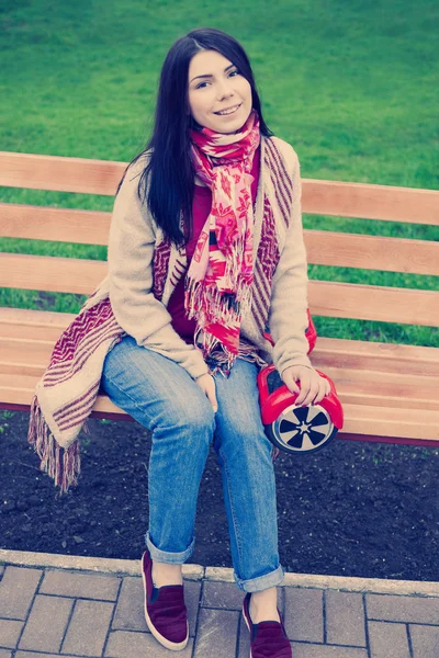 Young white girl with electric mini segway hover board scooter — Stock Photo, Image